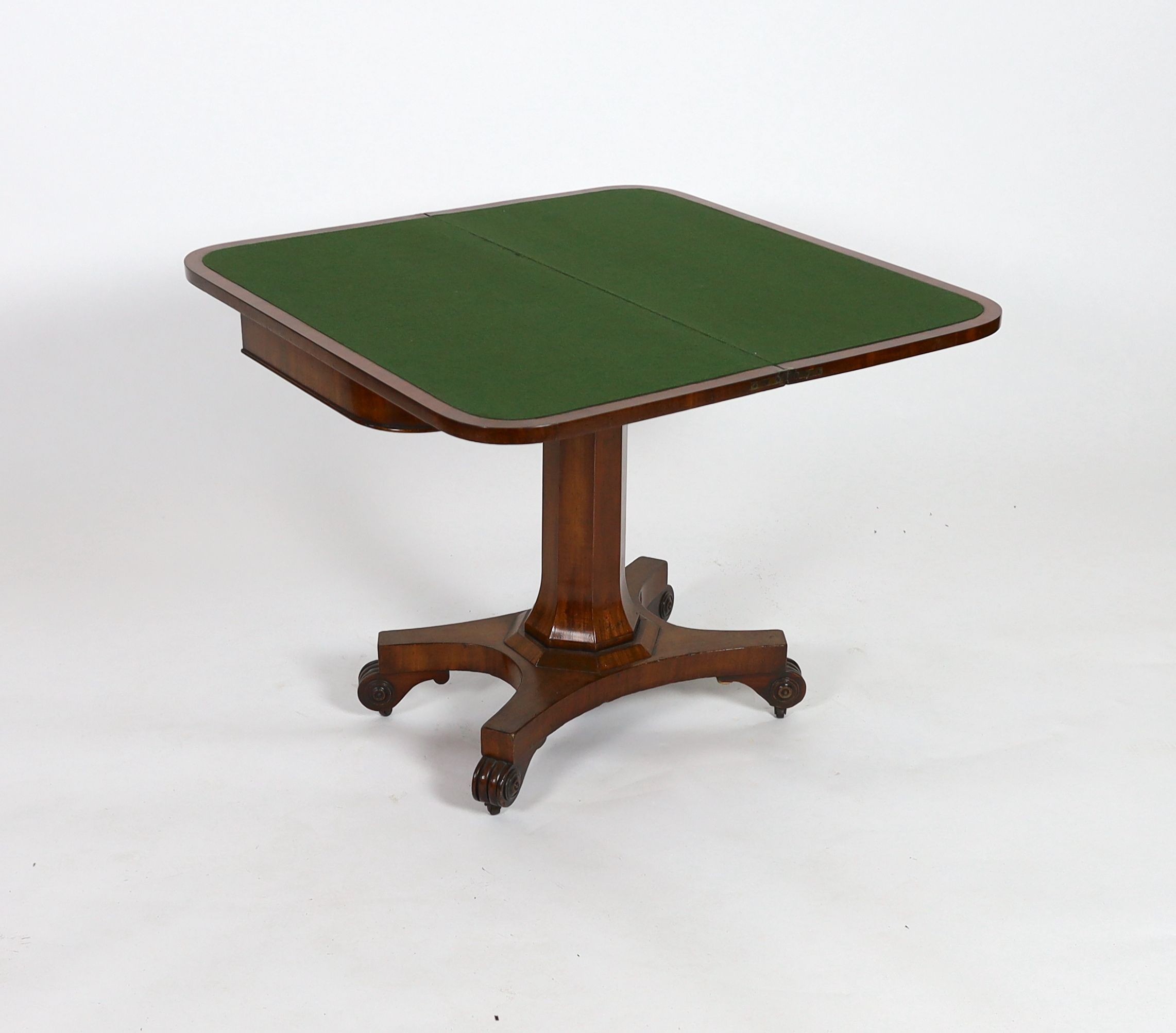 An early Victorian rectangular mahogany folding card table, on octagonal column, width 90cm depth 44cm height 74cm